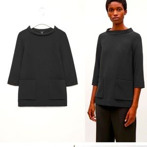 Cos Black Roll Neck Collar Blouse , 2 front Pockets, 3/4 Sleeve. Woman’s Size 6